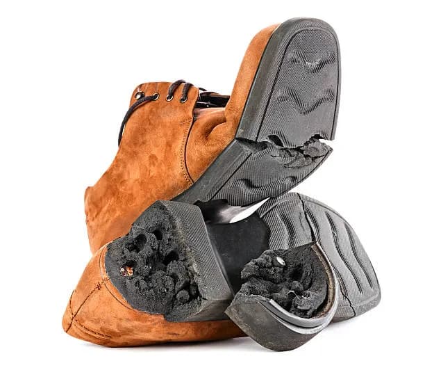 A broken shoe illustrating the frustration that led to Schault
